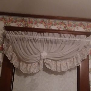 Pair of white scalloped valances